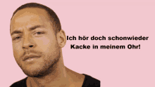 a man with a sad look on his face with the words ich hör doch schonwieder kacke in meinem ohr