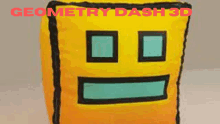 a geometric dash 3d pillow with a yellow face on it