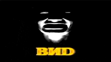 a black and white image of a man 's face with the word bid in yellow letters