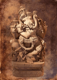 a statue of a deity with the word ganesha on the bottom