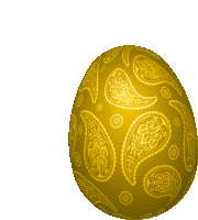 a golden egg with paisley designs on it