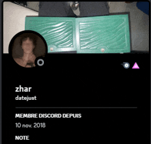 a black screen with a picture of a person named zhar