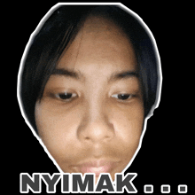 a picture of a woman 's face with the words " nyimak " written on it