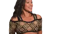 a woman wearing a crop top with the letters bb on it is smiling