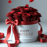 a box of red roses with the words happy birthday on it