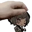 a hand is putting something on the head of a little girl .
