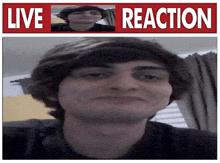 a man 's face is behind a sign that says ' live reaction '