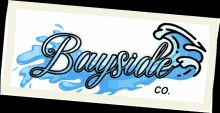 a logo for bayside co. shows a wave and the word bayside