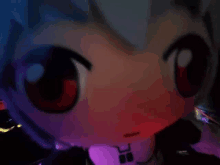 a close up of a doll 's face with red eyes in a dark room .