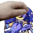 a close up of a person holding a donut over a cartoon character 's head .