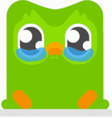 a green cartoon character with tears running down its eyes .