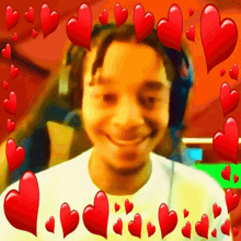 a boy with headphones is surrounded by hearts
