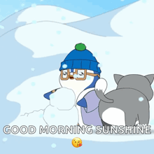 a cartoon of a penguin making a snowman with the words good morning sunshine above it