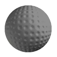 a gray golf ball with holes in it is floating in the air