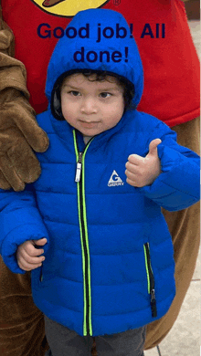 a boy in a blue jacket giving a thumbs up with the words good job all done below him