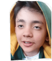 a young boy wearing a green and yellow hoodie is making a funny face