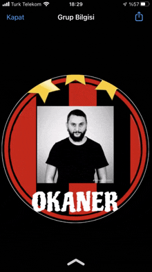 a phone screen shows a picture of a man with the name okaner on it