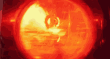 a close up of a red light with a blurred image of a person in the background .