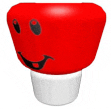 a red object with a black face on it