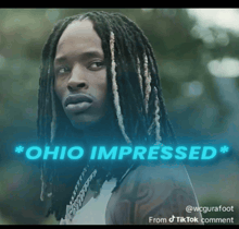 a man with dreadlocks and the words ohio impressed
