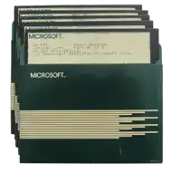 a stack of microsoft disks are stacked together