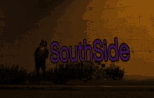 a person standing in front of a wall with southside written on it