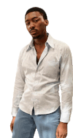 a man in a white shirt and blue jeans is standing in front of a white background