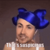 a man wearing a blue hat and a white tank top says that 's suspicious .
