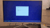 a computer monitor is displaying a screen that says ' confirming windows ' on it