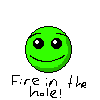 a pixel art of a green smiley face and the words fire in the hole .