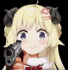 a girl with horns is holding a gun in her hand and smiling .