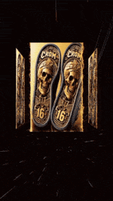 a pair of shoes with skulls and the number 16