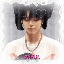 a young man wearing a cat ear hat and a necklace with the name ohyul written in pink