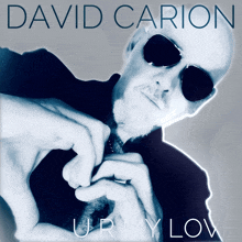 a david carion album cover shows a man making a heart shape with his hands