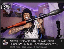 a man is holding a rocket launcher in a room .