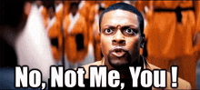 a man says " no not me you ! " in front of a group of prisoners