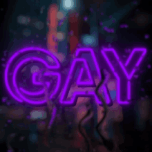 a purple neon sign that says gay in front of a blurry background .