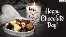 a happy chocolate day greeting card with a candle and some chocolates