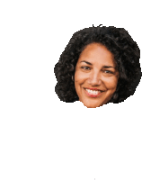 a woman with curly hair is smiling and looking at the camera