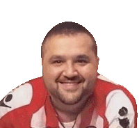 a man with a beard is wearing a red and white shirt and smiling for the camera .