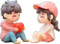 a boy and a girl are sitting next to each other and the boy is holding a red heart