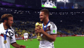 two soccer players on a field with the word russia on the bottom