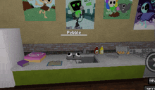 a cartoon character named pebble is sitting on a kitchen counter