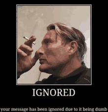 a poster of a man smoking a cigarette with the words ignored on it