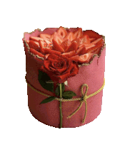 a pink cake with strawberries and a red rose with the letters ac on the bottom