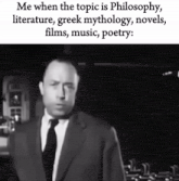 a man in a suit and tie is talking about philosophy literature greek mythology movies music and poetry