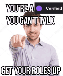 a man points at the camera with a caption that says you 're a verified