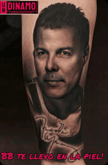 a tattoo of freddie mercury with the words bb te lleva en la piel below it