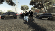 a blurry picture of two people standing next to cars