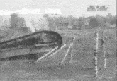 a black and white photo of a plane flying over a field with the words " soviet planes " on the bottom